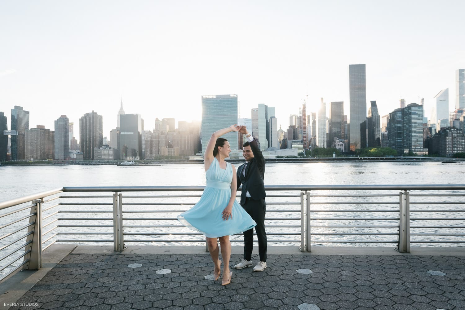 where to elope in NYC: Gantry Plaza State Park engagement photo session in Long Island City, Queens. Photos by NYC wedding photographer Everly Studios