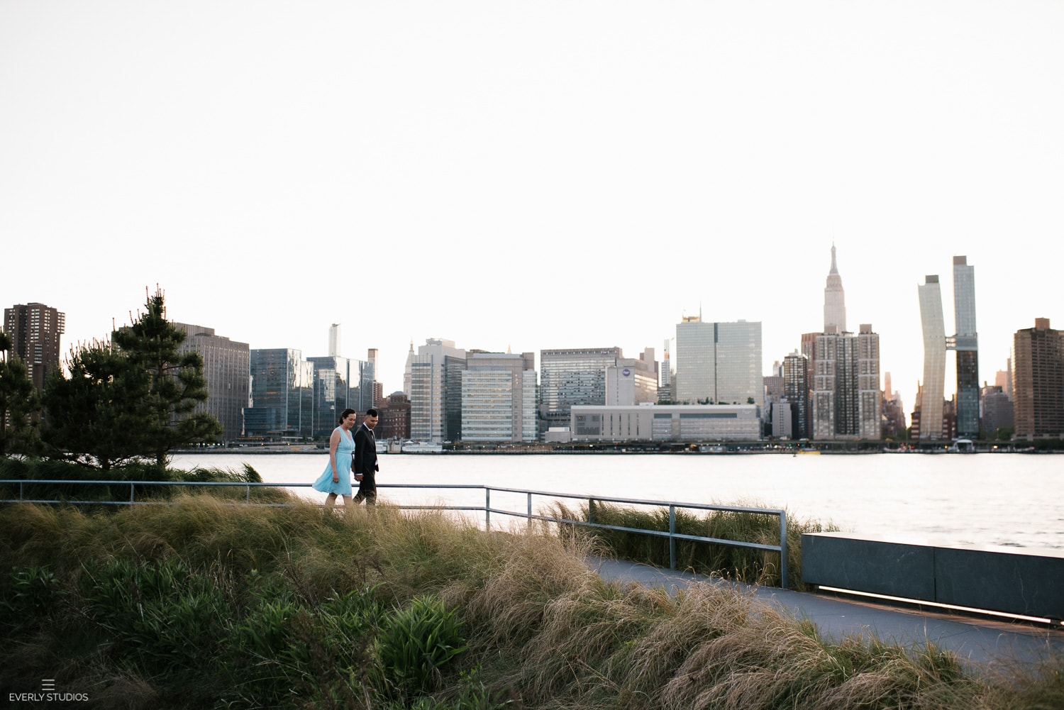 Gantry Plaza State Park engagement photo session in Long Island City, Queens. Photos by NYC wedding photographer Everly Studios